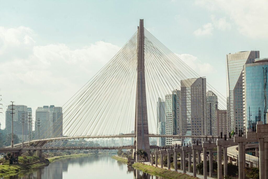 gray concrete bridge over river